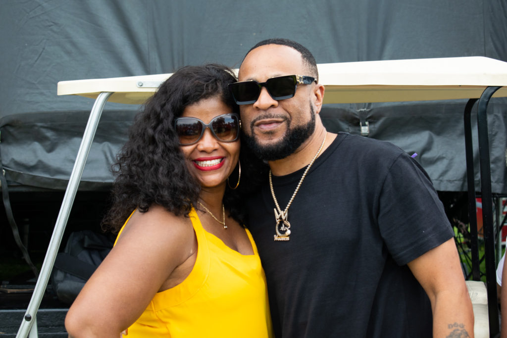 Power 92 DJ Pharris taking a photo at the Chosen Few Picnic