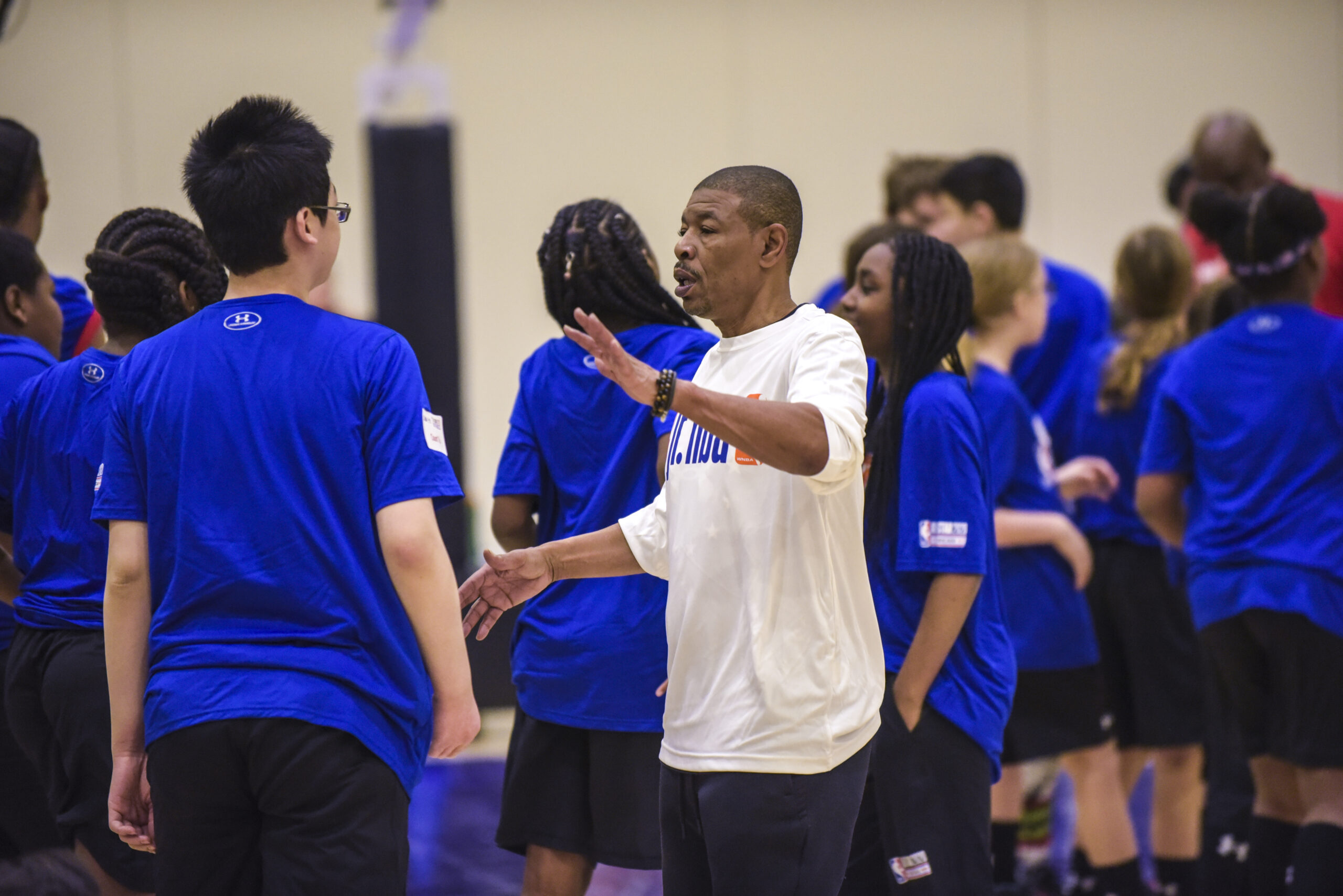 At Jr. NBA Day, Muggsy Bogues and other NBA greats taught CPS youth the importance of resilience and confidence