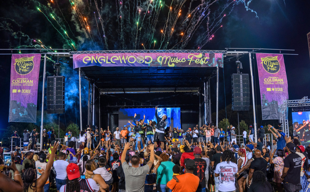 Rapper Waka Flocka Flame on stage at Englewood Music Festival on Sept. 14 getting the crowd hype with his performance. Photo by Christopher Lockridge.