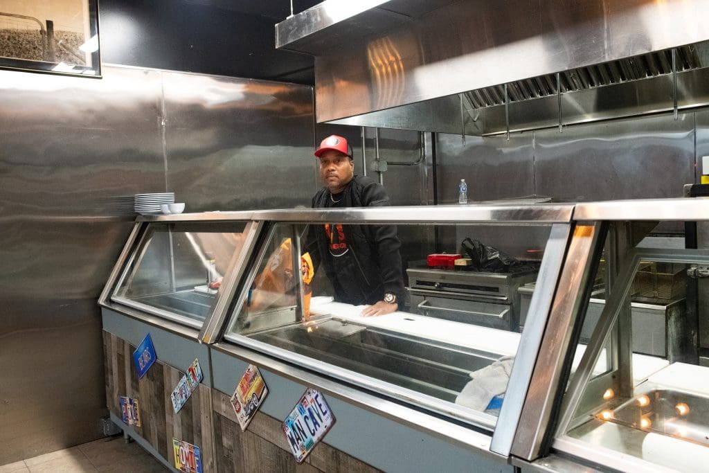Albert Johnson inside the new location of No Sauce AZ, a Black-owned smokehouse, located on 133 E 75th St. Photo by Ash Lane for The TRiiBE®