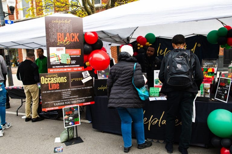 Residents shopping at "Spend In The Black" street fest on April 19, 2025. Photo by Ash Lane for The TRiiBE®