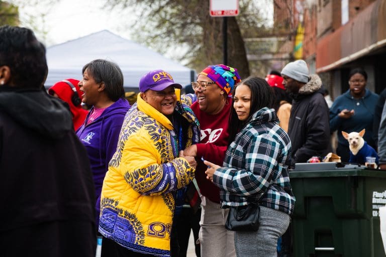 Greater Grand Crossing residents enjoying their time at "Spend In The Black" street fest on 75th and King Dr. on April 19, 2025. Photo by Ash Lane for The TRiiBE®
