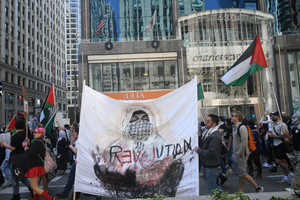 A pro-Palestine protest marches down the Magnificent Mile after the "No Kings Rally and March" ends on June 14, 2025. Photo by The TRiiBE