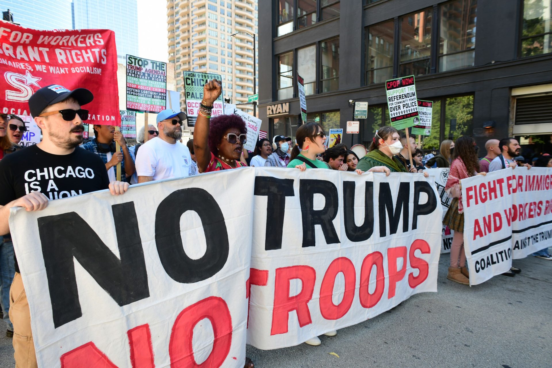 ‘Workers Over Billionaires’ marchers send a message to Trump: ‘No troops in Chicago’