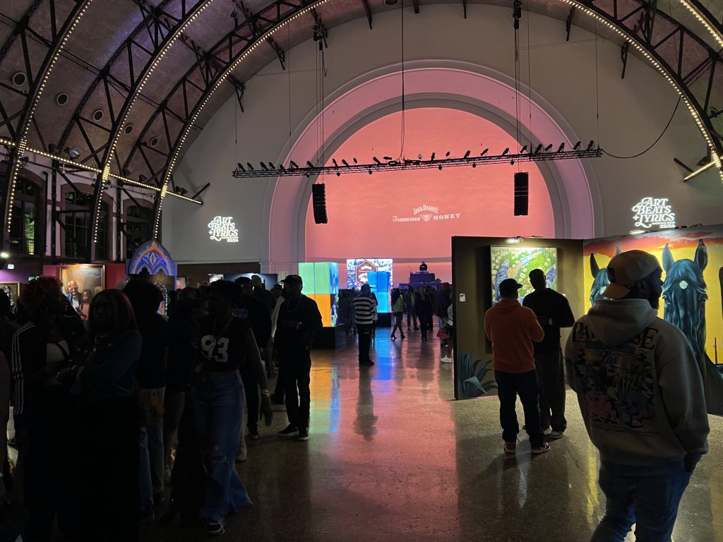 Art Beats + Lyrics is a touring art exhibit that was held at Navy Pier’s Aon Grand Ballroom on October 17. Photo by Rome J. for The TRiiBE®